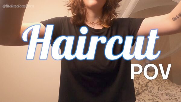 Still of brunette woman giving a haircut to the viewer text "Haircut POV @thelusciouslibra"